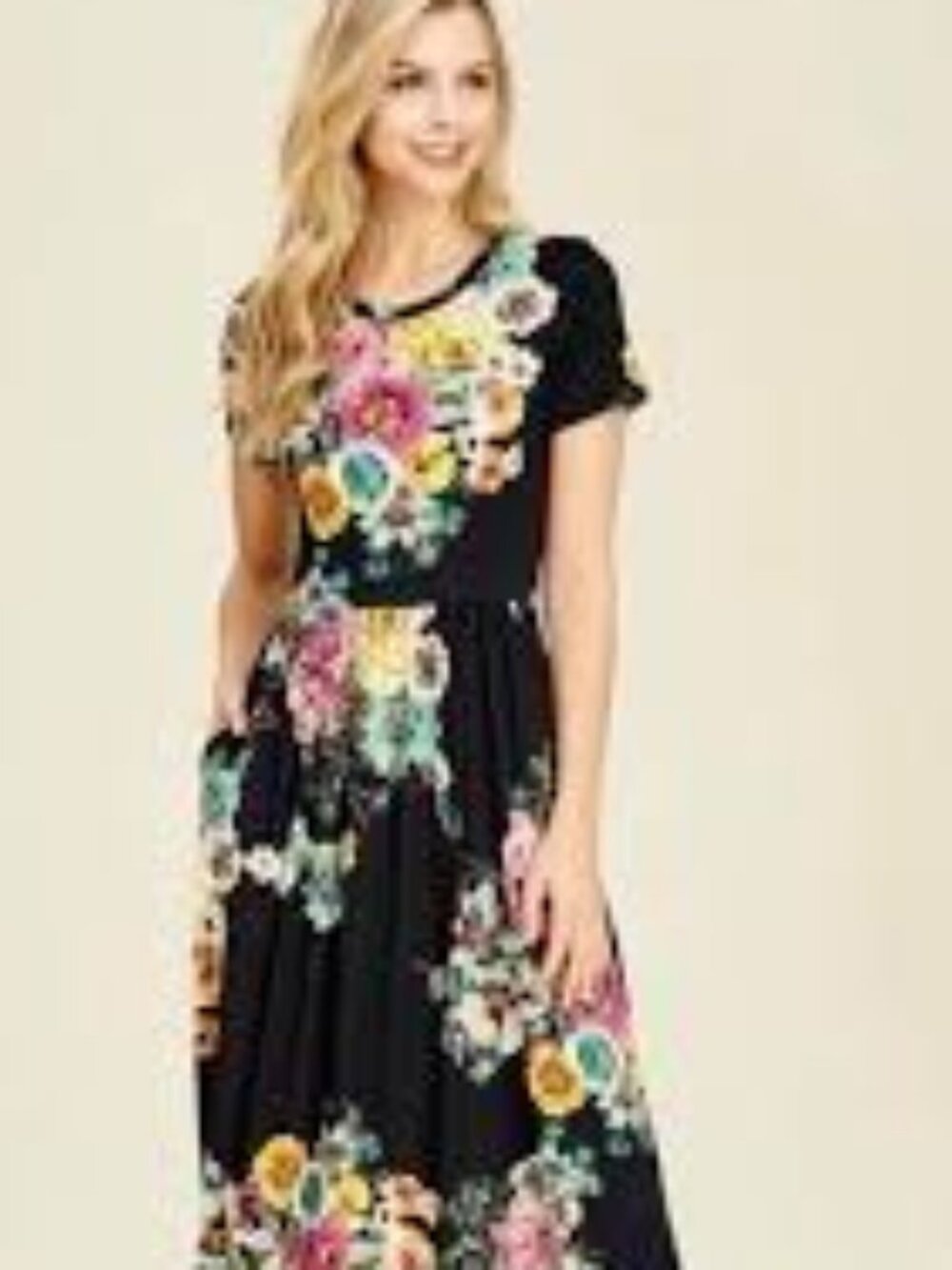 Black  midi dress with a vibrant floral print—very soft and stretchy. Size XL.